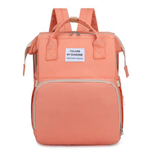 Load image into Gallery viewer, Stylish orange Mommy Phoenix™ diaper bag with backpack straps and front pocket.
