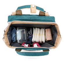 Load image into Gallery viewer, Inside view of spacious Mommy Phoenix™- Mommy Diaper Bag showing organized storage for baby essentials.
